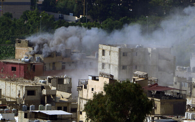 Smoke rises during clashes between members of the Palestinian Fatah group and Islamist groups in the Palestinian refugee camp of Ein el-Hilweh near the southern port city of Sidon, Lebanon, September 10, 2023. (AP Photo/Bilal Hussein) Smoke rises during clashes between members of the Palestinian Fatah group and Islamist groups in the Palestinian refugee camp of Ein el-Hilweh near the southern port city of Sidon, Lebanon, September 10, 2023. (AP Photo/Bilal Hussein)