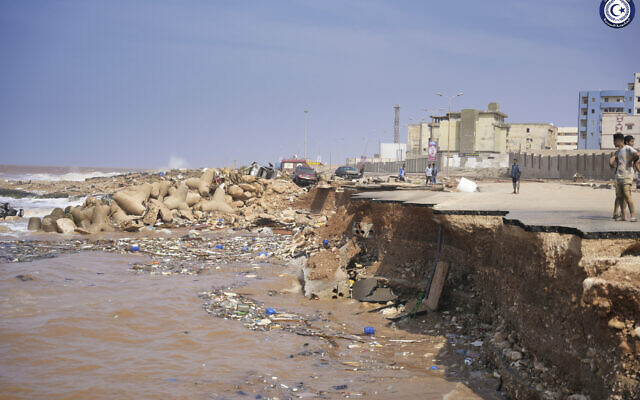 In this photo provided by the Libyan government, a seaside road is collapsed after heavy flooding in Derna, Libya, on Monday, Sept. 11, 2023. (Libyan government via AP) In this photo provided by the Libyan government, a seaside road is collapsed after heavy flooding in Derna, Libya, on Monday, Sept. 11, 2023. (Libyan government via AP)