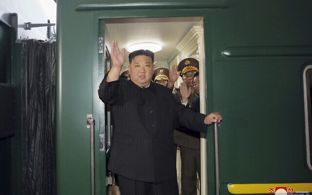 This photo provided by the North Korean government on September 10, 2023, shows North Korean leader Kim Jong Un waving from a train in Pyongyang as he leaves for Russia. (Korean Central News Agency/Korea News Service via AP) This photo provided by the North Korean government on September 10, 2023, shows North Korean leader Kim Jong Un waving from a train in Pyongyang as he leaves for Russia. (Korean Central News Agency/Korea News Service via AP)