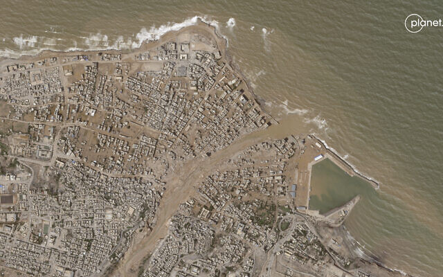 This satellite photo from Planet Labs PBC shows flooding in Derna, Libya, on Tuesday, Sept. 12, 2023. (Planet Labs PBC via AP) This satellite photo from Planet Labs PBC shows flooding in Derna, Libya, on Tuesday, Sept. 12, 2023. (Planet Labs PBC via AP)