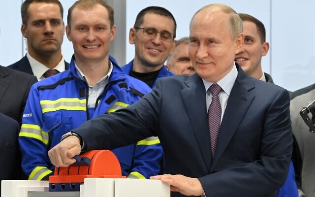 Russian President Vladimir Putin, foreground right, attends the launch ceremony for the first technological line for liquefying natural gas on gravity bases as part of the Arctic LNG2 project, in the village of Belokamenka, about 1,063 miles north of Moscow, Murmansk region, Russia, Thursday, July 20, 2023. (Alexander Kazakov, Sputnik, Kremlin Pool Photo via AP, File) Russian President Vladimir Putin, foreground right, attends the launch ceremony for the first technological line for liquefying natural gas on gravity bases as part of the Arctic LNG2 project, in the village of Belokamenka, about 1,063 miles north of Moscow, Murmansk region, Russia, Thursday, July 20, 2023. (Alexander Kazakov, Sputnik, Kremlin Pool Photo via AP, File)