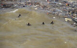 Divers look for flash flood victims in the city of Derna, Libya, September 18, 2023. (AP Photo/Yousef Murad)
