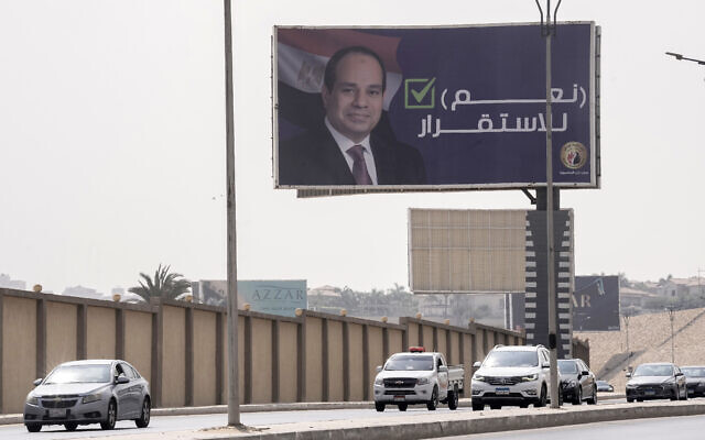 Vehicles pass under a billboard supporting Egyptian President Abdel Fattah el-Sissi for the coming presidential elections, erected by Egypt's political party of Homat Watan, the Protectors of the Nation, in Cairo, Egypt, on September 4, 2023. Arabic reads, 'Yes for stability.' Egypt will hold a presidential election over three days in December, officials announced Monday, September 25, 2023. (AP Photo/Amr Nabil, File) Vehicles pass under a billboard supporting Egyptian President Abdel Fattah el-Sissi for the coming presidential elections, erected by Egypt's political party of Homat Watan, the Protectors of the Nation, in Cairo, Egypt, on September 4, 2023. Arabic reads, 'Yes for stability.' Egypt will hold a presidential election over three days in December, officials announced Monday, September 25, 2023. (AP Photo/Amr Nabil, File)