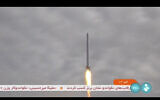 This frame grab from video aired by Iranian state television on September 27, 2023, shows what Iran's Communication Minister Isa Zarepour said is a Noor-3 satellite being launched from an undisclosed location in Iran. (IRIB via AP)