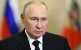 Russian President Vladimir Putin speaks during a video celebrating the anniversary of the referendum called illegal by the UN in four Ukrainian regions one year ago, in Moscow, Russia, Saturday, September 30, 2023. (Mikhail Metzel, Sputnik, Kremlin Pool Photo via AP)