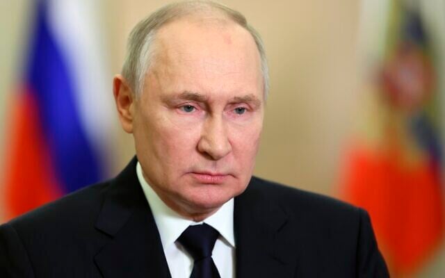 Russian President Vladimir Putin speaks during a video celebrating the anniversary of the referendum called illegal by the UN in four Ukrainian regions one year ago, in Moscow, Russia, Saturday, September 30, 2023. (Mikhail Metzel, Sputnik, Kremlin Pool Photo via AP)