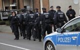 Illustrative: Police patrol in Alsdorf, near Aachen, western Germany, November 17, 2015. (Hermann J. Knippertz/AP)