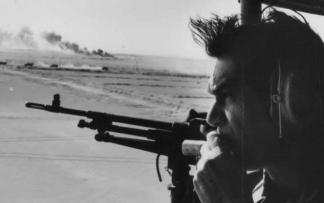 Illustrative: IDF Chief of Staff David Elazar looks over the Suez Canal during the Yom Kippur War, October 1973. (State Archives)