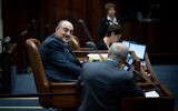 Deputy Knesset Speaker Likud MK Nissim Vaturi at a discussion and vote on the coalition's reasonableness bill at the Knesset plenum in Jerusalem, July 23, 2023. (Yonatan Sindel/Flash90)