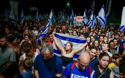 Activists protest against the government's judicial overhaul outside the president's residence in Jerusalem on July 29, 2023. (Chaim Goldberg/Flash90)