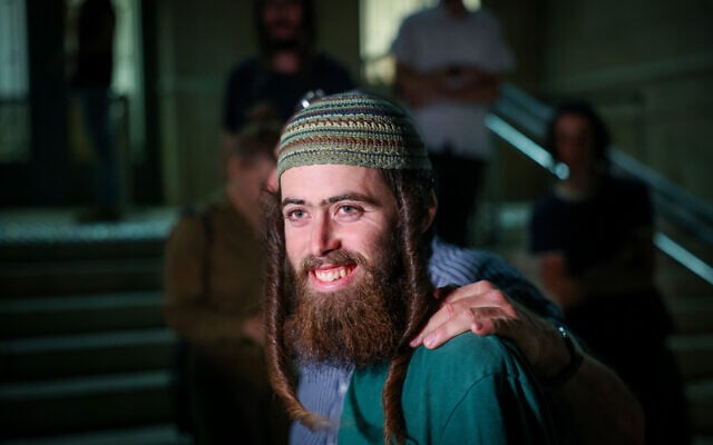 Elisha Yered, who was arrested on suspicion of being involved in the death of 19-year-old Palestinian Qusai Jamal Maatan in the West Bank village of Burqa, seen after his release to house arrest at the District Court in Jerusalem, on August 9, 2023. Chaim Goldberg/Flash90) Elisha Yered, who was arrested on suspicion of being involved in the death of 19-year-old Palestinian Qusai Jamal Maatan in the West Bank village of Burqa, seen after his release to house arrest at the District Court in Jerusalem, on August 9, 2023. Chaim Goldberg/Flash90)