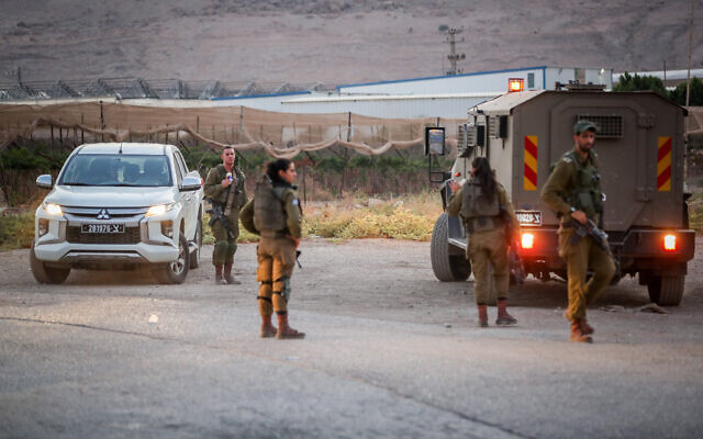 Israeli soldiers at the scene of a shooting attack in the Jordan Valley, September 5, 2023. (Jamal Awad/Flash90) Israeli soldiers at the scene of a shooting attack in the Jordan Valley, September 5, 2023. (Jamal Awad/Flash90)
