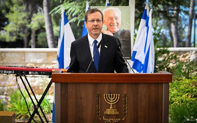 President Isaac Herzog at a memorial ceremony for late president Shimon Peres, at the Mount Herzl cemetery in Jerusalem, on September 6, 2023. (Arie Leib Abrams/Flash90) President Isaac Herzog at a memorial ceremony for late president Shimon Peres, at the Mount Herzl cemetery in Jerusalem, on September 6, 2023. (Arie Leib Abrams/Flash90)