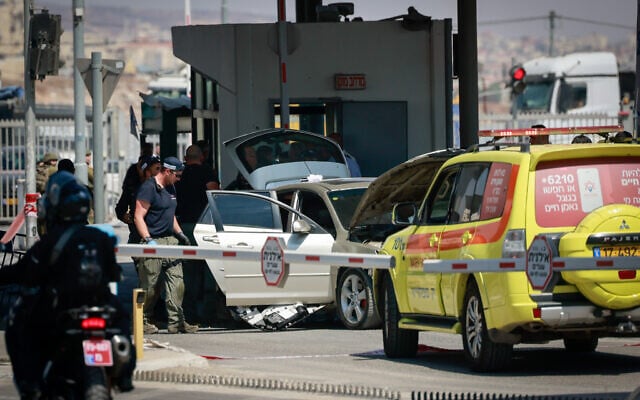 The scene of a suspected car-ramming attack at the Qalandiya Crossing near Jerusalem, September 21, 2023. (Chaim Goldberg/FLASH90) The scene of a suspected car-ramming attack at the Qalandiya Crossing near Jerusalem, September 21, 2023. (Chaim Goldberg/FLASH90)