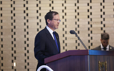 President Isaac Herzog speaks at a state ceremony marking 50 years since the Yom Kippur War at the Mount Herzl military cemetery in Jerusalem, September 26, 2023. (Chaim Goldberg/FLASH90)