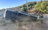 Police at the site where a bus carrying school children rolled off the road near Beit Shemesh on September 27, 2023. (Israel Police)