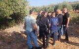 Officers investigate a double homicide in an olive grove near Abu Snan, September 6, 2023. (Police spokesperson)