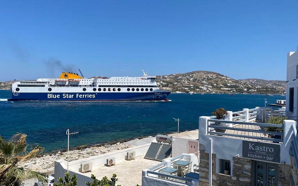 Every day, several ferries bring hundreds of people to the Greek island of Paros, pictured here in August 2023. (Romain Chauvet)