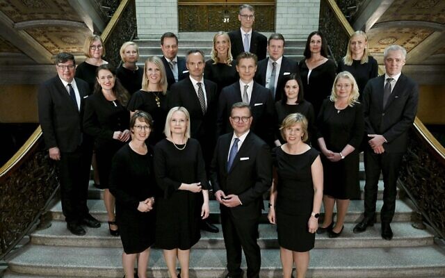 The new government of Finland led by Prime Minister Petteri Orpo (front row center) poses for a photo in Helsinki, Finland, June 20, 2023. Former minister of economic affairs Vilhelm Junnila (third row, third from left) resigned after 10 days over Nazi jokes made in 2019. (Antti Aimo-Koivisto / Lehtikuva / AFP via Getty Images via JTA) The new government of Finland led by Prime Minister Petteri Orpo (front row center) poses for a photo in Helsinki, Finland, June 20, 2023. Former minister of economic affairs Vilhelm Junnila (third row, third from left) resigned after 10 days over Nazi jokes made in 2019. (Antti Aimo-Koivisto / Lehtikuva / AFP via Getty Images via JTA)
