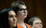 FILE -Ethan Crumbley stands with his attorneys, Paulette Loftin and Amy Hopp, during his hearing at Oakland County Circuit Court, in Pontiac, Michigan, August 1, 2023. (Clarence Tabb Jr./Detroit News via AP, Pool, File)