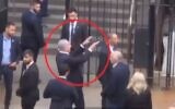 Prime Minister Benjamin Netanyahu makes a hand gesture toward a protester shouting "Shame!" at him on a street in New York, September 22, 2023. (Screenshot: X; used in accordance with Clause 27a of the Copyright Law)