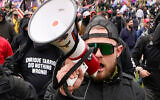 Proud Boy member Ethan Nordean walks toward the US Capitol in Washington, in support of then US president Donald Trump, January 6, 2021. (AP Photo/Carolyn Kaster, File)