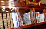 A showcase with antique dictionaries inside the directors' lounge at the Royal Spanish Academy (the Real Academia Espanola, RAE) in Madrid, 21 January 2004 (JAVIER SORIANO / AFP)