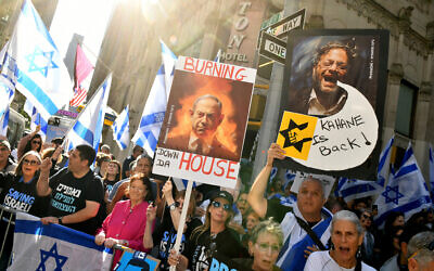 Anti-judicial overhaul protesters welcome Prime Minister Benjamin Netanyahu to his meeting with US President Joe Biden in New York, on September 20, 2023. (Craig Barritt/Getty Images for New York Protest Movement/AFP)