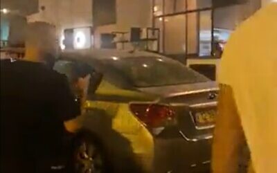A car which crashed into a pub in Givatayim, September 5, 2023. (screen capture: X)
