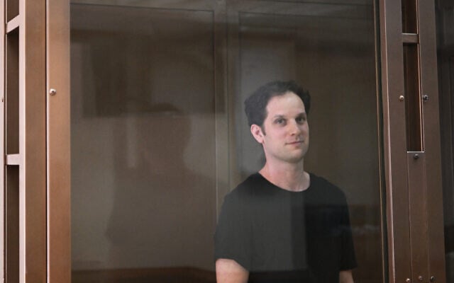 US journalist Evan Gershkovich, arrested on espionage charges, stands inside a defendants' cage before a hearing to consider an appeal on his extended detention at The Moscow City Court in Moscow on June 22, 2023. (Photo by Natalia KOLESNIKOVA / AFP) US journalist Evan Gershkovich, arrested on espionage charges, stands inside a defendants' cage before a hearing to consider an appeal on his extended detention at The Moscow City Court in Moscow on June 22, 2023. (Photo by Natalia KOLESNIKOVA / AFP)