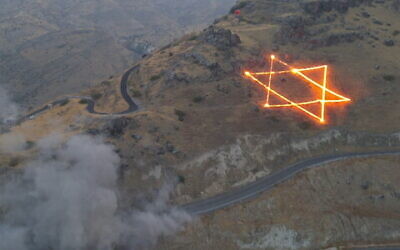 Charges shaped like a Star of David are detonated in a controlled explosion to clear rocks in the Golan Heights on August 29, 2023 (Screencapture/ Channel 12: used in accordance with Clause 27a of the Copyright Law)