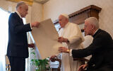 World Jewish Congress President Ronald Lauder gives Pope Francis a 'Kishreinu' (Hebrew for 'Our Bond') document marking influence of the Catholic Church's Nostra Aetate declaration on Catholic-Jewish relations, October 19, 2023. (Shahar Azran/WJC via JTA)