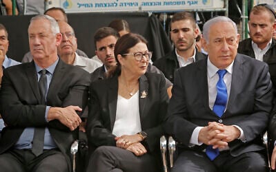 File: Prime Minister Benjamin Netanyahu (R), President of the Supreme Court Esther Hayut (C) and Benny Gantz (L), then-leader of the Blue and White party, attend a memorial ceremony for late president Shimon Peres, at Mount Herzl in Jerusalem on September 19, 2019. (Gil Cohen-Magen/AFP)