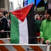 Pro-Palestinian activists during a protest in New York City, October 8, 2023. (Luke Tress/Times of Israel)