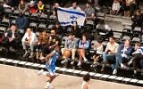 Israel supporters at a game between the Brooklyn Nets and Israel's Maccabi Raanana, at the Barclays Center in Brooklyn, October 12, 2023. (Luke Tress/JTA)