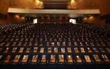 Pictures of over 1,000 persons abducted, missing, or killed in the Hamas onslaught on southern Israel displayed at a temporary exhibition in the Smolarz Auditorium at Tel Aviv University, October 19, 2023. (Chen Galili)