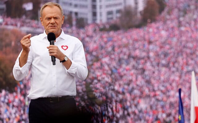 Polish opposition leader, former premier and head of the centrist Civic Coalition bloc, Donald Tusk addresses participants at a rally in Warsaw on October 1, 2023. (Wojtek Radwanski / AFP)
