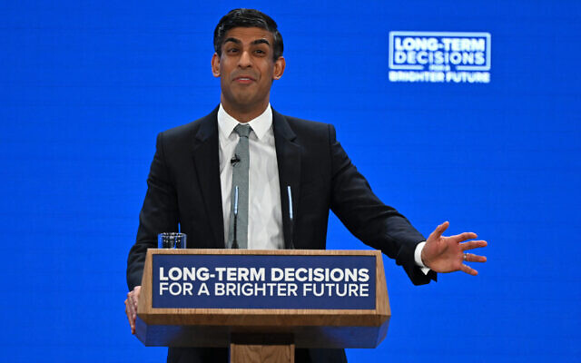 Britain's Prime Minister Rishi Sunak addresses delegates at the annual Conservative Party conference in Manchester, northern England, on October 4, 2023. (Justin Tallis/AFP) Britain's Prime Minister Rishi Sunak addresses delegates at the annual Conservative Party conference in Manchester, northern England, on October 4, 2023. (Justin Tallis/AFP)