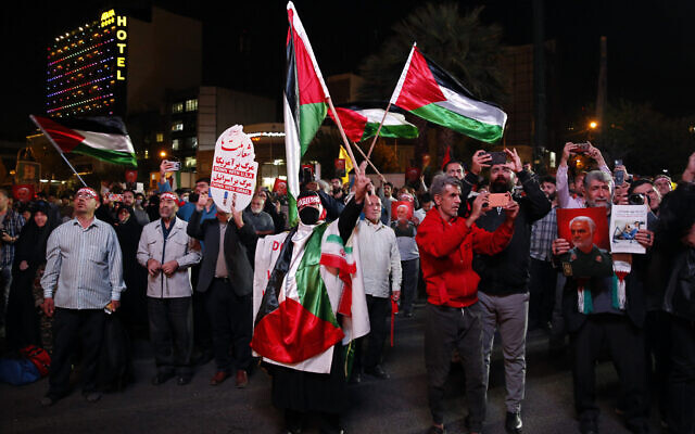 Iranians attend a gathering in Tehran to express their solidarity with Palestine after Hamas terrorists launched a brutal onslaught from the Gaza Strip, October 2023. (AFP) Iranians attend a gathering in Tehran to express their solidarity with Palestine after Hamas terrorists launched a brutal onslaught from the Gaza Strip, October 2023. (AFP)