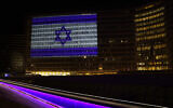 File: Israel's flag on the Berlaymont, the European Commission headquarters in Brussels, a day after the Palestinian terror group Hamas launched its devastating onslaught on Israel, October 8, 2023. (JOHANNA GERON/AFP)