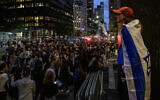 People attend a 'Stand with Israel' vigil and rally in New York City on October 10, 2023. (Ed JONES / AFP)