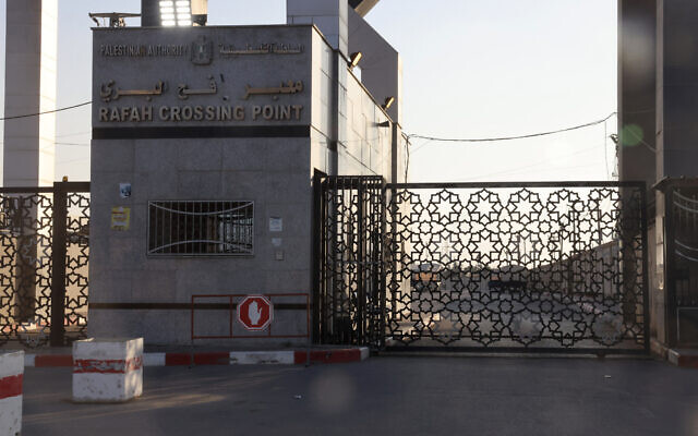 A picture taken on October 10, 2023, shows the closed gates of the Rafah border crossing with Egypt. (Said Khatib / AFP)