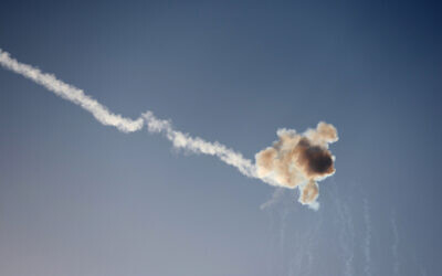 Rockets fired from the Gaza Strip are intercepted by Israel's Iron Dome defense missile system over the southern city of Sderot on October 12, 2023. (JACK GUEZ / AFP)