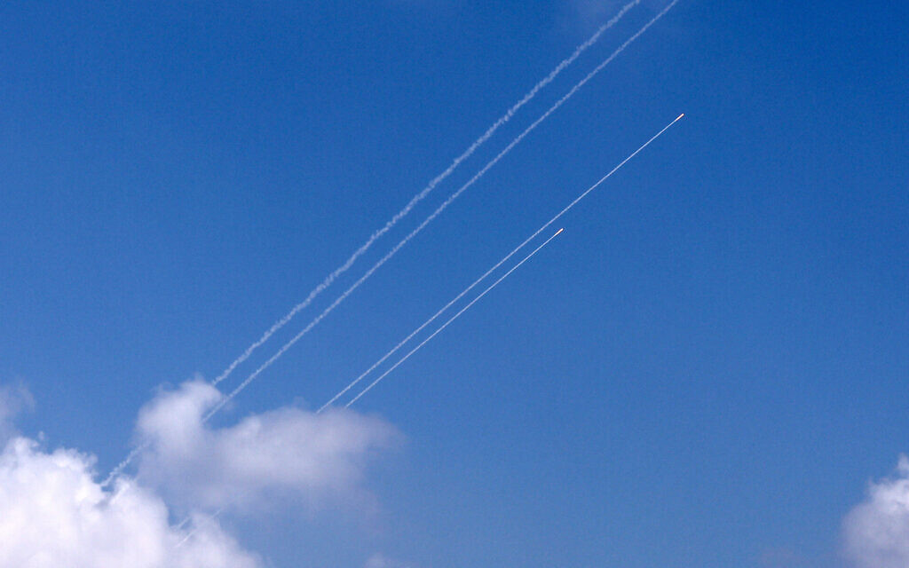 Picture taken from Sderot shows rockets fired from the Gaza Strip toward Israel, October 14, 2023. (Thomas COEX / AFP)