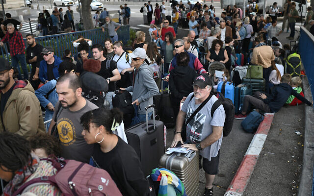 US citizens wait to be evacuated from the port of Haifa to Cyprus, on October 16, 2023. -(Photo by Aris MESSINIS / AFP) US citizens wait to be evacuated from the port of Haifa to Cyprus, on October 16, 2023. -(Photo by Aris MESSINIS / AFP)