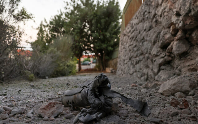 A picture shows a fragment of a rocket reportedly fired from Lebanon in the northern Israeli town of Kiryat Shmona close to the border with Lebanon on October 18, 2023. (Photo by jalaa marey / AFP) A picture shows a fragment of a rocket reportedly fired from Lebanon in the northern Israeli town of Kiryat Shmona close to the border with Lebanon on October 18, 2023. (Photo by jalaa marey / AFP)