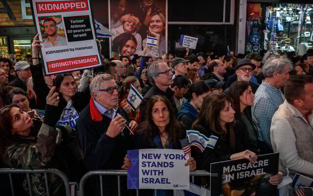 Members of the Jewish community and supporters of Israel attend a rally calling for the release of hostages held by the Gaza-ruling Hamas terror group, in Times Square, New York on October 19, 2023. (Ed Jones/AFP) Members of the Jewish community and supporters of Israel attend a rally calling for the release of hostages held by the Gaza-ruling Hamas terror group, in Times Square, New York on October 19, 2023. (Ed Jones/AFP)