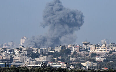 This picture taken from Sderot shows smoke billowing over the northern Gaza Strip on October 19, 2023. (Jack Guez/AFP)