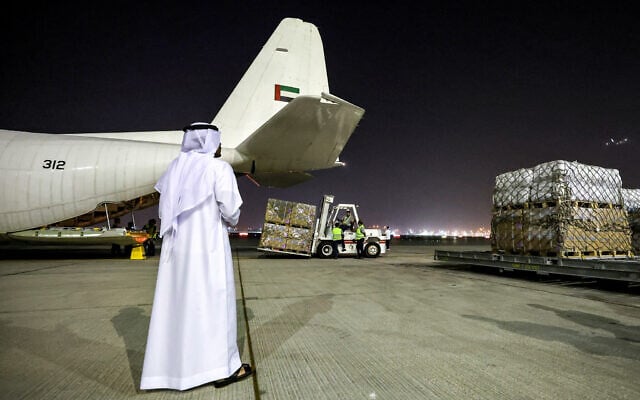 Humanitarian aid provided by the United Nations is loaded onto a United Arab Emirates Air Force C-130H-30 Hercules turboprop military transport aircraft at Dubai International Airport before departure for Cairo on October 19, 2023. (Photo by Giuseppe CACACE / AFP) Humanitarian aid provided by the United Nations is loaded onto a United Arab Emirates Air Force C-130H-30 Hercules turboprop military transport aircraft at Dubai International Airport before departure for Cairo on October 19, 2023. (Photo by Giuseppe CACACE / AFP)