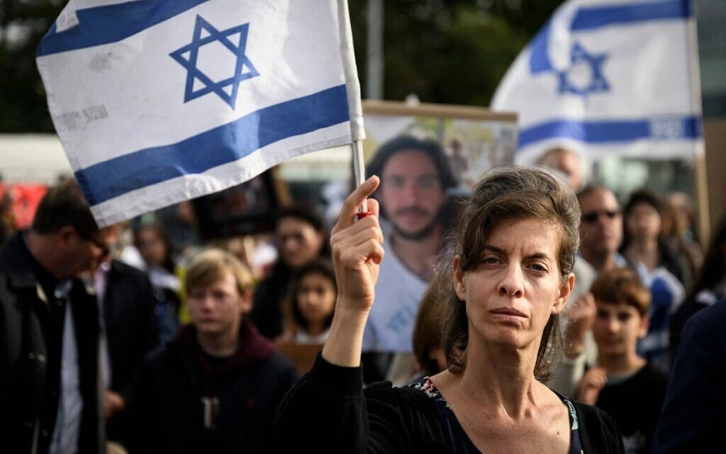 Protesters attend a rally calling for the release of hostages held by Hamas, near the United Nations office in Geneva, on October 22, 2023. (Gabriel MONNET / AFP)
